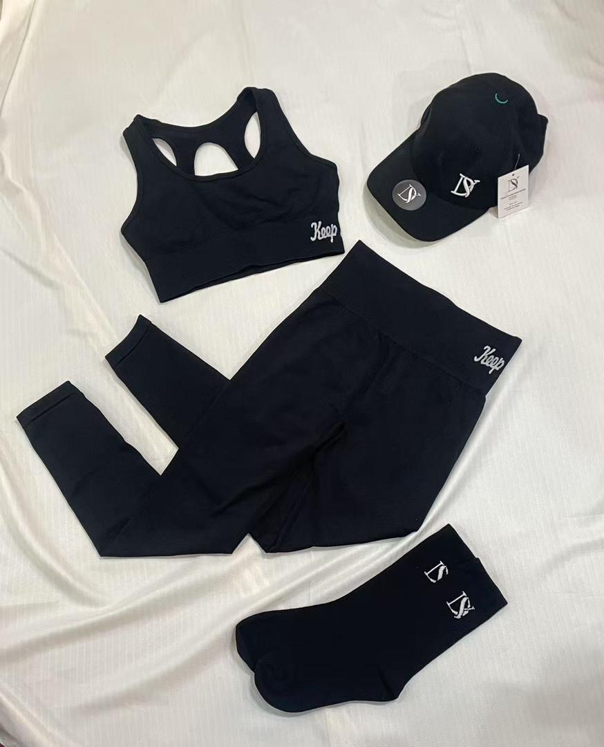Set of top bra, leggings, cap and sports socks for training, gym, yoga